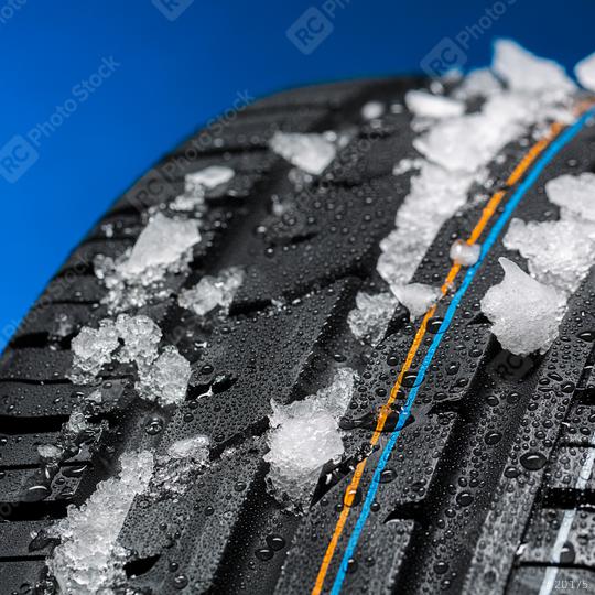 car tire with snow in winter on blue background  : Stock Photo or Stock Video Download rcfotostock photos, images and assets rcfotostock | RC Photo Stock.: