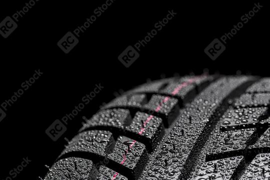 Car tires close-up Winter wheel profile structure with waterdrops on blue black background  : Stock Photo or Stock Video Download rcfotostock photos, images and assets rcfotostock | RC Photo Stock.: