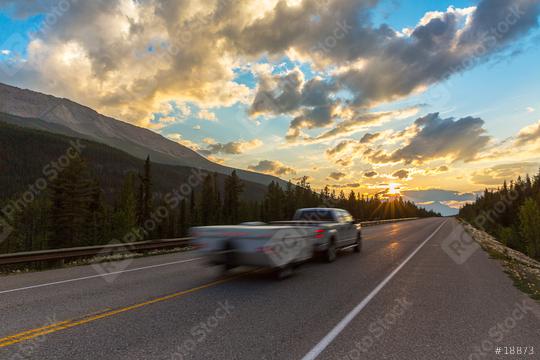 Caravan or recreational vehicle motor home trailer on a mountain road in Canada at sunset  : Stock Photo or Stock Video Download rcfotostock photos, images and assets rcfotostock | RC Photo Stock.: