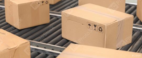 Cardboard boxes on a conveyor line, Delivery concept image  : Stock Photo or Stock Video Download rcfotostock photos, images and assets rcfotostock | RC Photo Stock.: