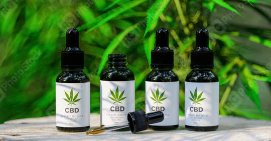 CBD cannabis OIL bottles. Cannabis oil in pipette, hemp product. Concept of herbal alternative medicine, cbd oil, pharmaceutical industry  : Stock Photo or Stock Video Download rcfotostock photos, images and assets rcfotostock | RC-Photo-Stock.:
