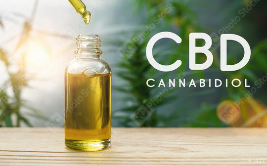 CBD droplet dosing a biological and ecological hemp plant herbal pharmaceutical cbd oil from a jar. Concept of herbal alternative medicine, cbd oil, pharmaceutical industry  : Stock Photo or Stock Video Download rcfotostock photos, images and assets rcfotostock | RC Photo Stock.: