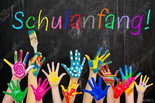 Children’s colorful painted hands raised in excitement against a chalkboard background with the word "Schulanfang!" written in vibrant colors, celebrating creativity and the beginning of the school ye  : Stock Photo or Stock Video Download rcfotostock photos, images and assets rcfotostock | RC Photo Stock.: