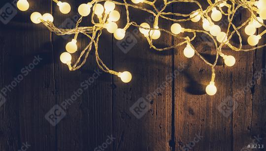 Christmas lights over wooden planks  : Stock Photo or Stock Video Download rcfotostock photos, images and assets rcfotostock | RC Photo Stock.: