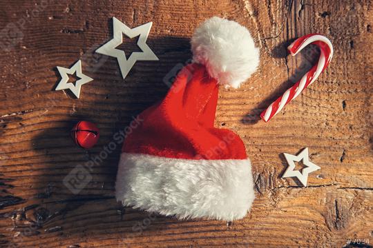 christmas santa hat with candy cane and decoration on a wooden board, Merry Christmas background  : Stock Photo or Stock Video Download rcfotostock photos, images and assets rcfotostock | RC Photo Stock.: