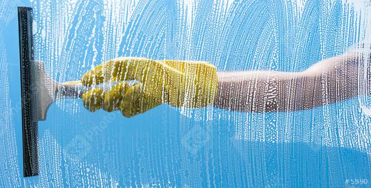 Cleaning concept - Young Man washing window  : Stock Photo or Stock Video Download rcfotostock photos, images and assets rcfotostock | RC Photo Stock.: