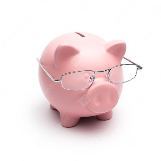 Clever Piggy Bank with Reading glasses  : Stock Photo or Stock Video Download rcfotostock photos, images and assets rcfotostock | RC Photo Stock.:
