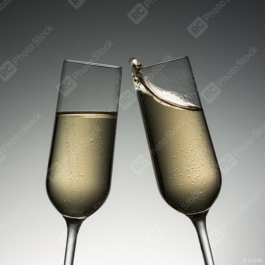 clink glasses with champagne splash  : Stock Photo or Stock Video Download rcfotostock photos, images and assets rcfotostock | RC Photo Stock.: