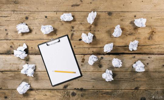 Clipboard with white sheet and pen with Crumpled paper balls on wood table background, copyspace for your individual text.  : Stock Photo or Stock Video Download rcfotostock photos, images and assets rcfotostock | RC Photo Stock.: