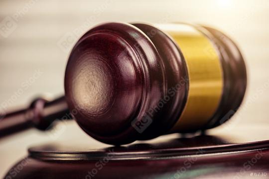Close up of a judge gavel and law books in the background of a courtroom  : Stock Photo or Stock Video Download rcfotostock photos, images and assets rcfotostock | RC Photo Stock.:
