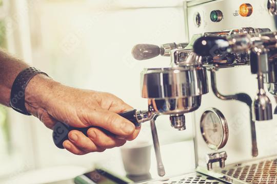 Close up of barista preparing fresh espresso on professional brewing machinery   : Stock Photo or Stock Video Download rcfotostock photos, images and assets rcfotostock | RC Photo Stock.: