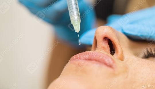 Close up of cosmetic Anti-aging face injection in female lips. c  : Stock Photo or Stock Video Download rcfotostock photos, images and assets rcfotostock | RC Photo Stock.: