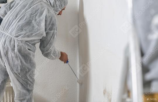 Close up of painter working with paint roller to paint the room in white color. do it yourself concept image  : Stock Photo or Stock Video Download rcfotostock photos, images and assets rcfotostock | RC-Photo-Stock.: