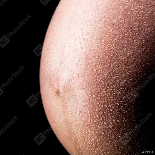 close-up from a pregnant belly with rain drops  : Stock Photo or Stock Video Download rcfotostock photos, images and assets rcfotostock | RC Photo Stock.: