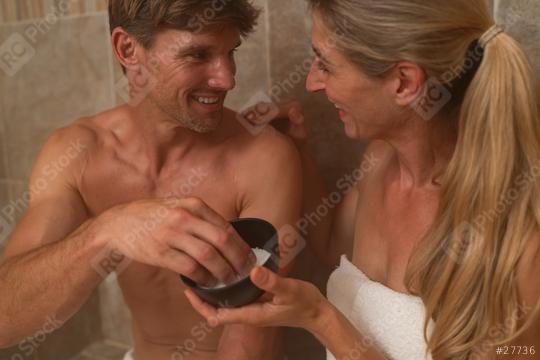 Close-up of a couple in a steam bath sharing a salt scrub and smiling at each other. Wellness spa hotel concept image  : Stock Photo or Stock Video Download rcfotostock photos, images and assets rcfotostock | RC Photo Stock.: