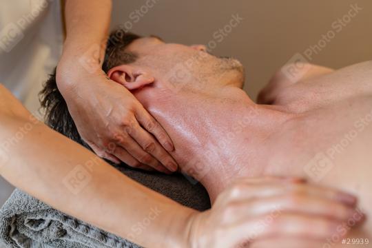 Close-up of a male receiving a detailed neck massage from a therapist. Wellness Hotel Concept image.  : Stock Photo or Stock Video Download rcfotostock photos, images and assets rcfotostock | RC Photo Stock.: