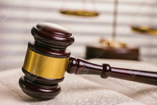 Closeup of a open law book with a judges gavel with scale   : Stock Photo or Stock Video Download rcfotostock photos, images and assets rcfotostock | RC Photo Stock.: