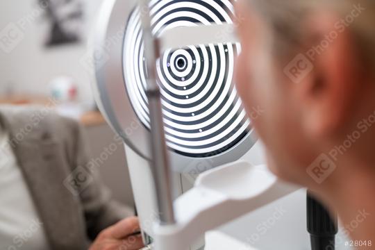 Close-up of a patient undergoing an eye examination with a keratograph or phoropter at a clinic.  : Stock Photo or Stock Video Download rcfotostock photos, images and assets rcfotostock | RC Photo Stock.: