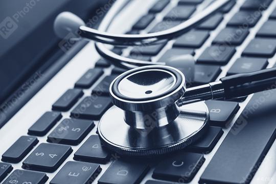Close-up of a stethoscope on laptop keyboard  : Stock Photo or Stock Video Download rcfotostock photos, images and assets rcfotostock | RC Photo Stock.: