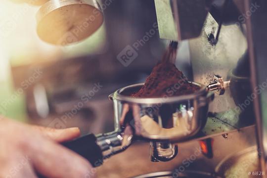 Close-up of barista grinding coffe in a coffeeshop  : Stock Photo or Stock Video Download rcfotostock photos, images and assets rcfotostock | RC Photo Stock.: