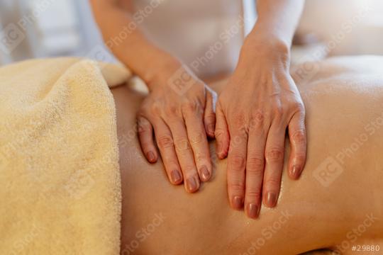 Close-up of hands performing a back massage on a client covered with a towel. beauty salon Wellness Hotel Concept image  : Stock Photo or Stock Video Download rcfotostock photos, images and assets rcfotostock | RC Photo Stock.: