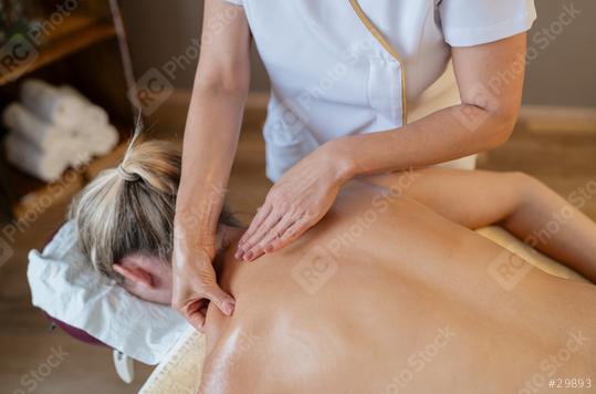 Close-up of hands performing a back massage on a woman at a spa resort  : Stock Photo or Stock Video Download rcfotostock photos, images and assets rcfotostock | RC Photo Stock.: