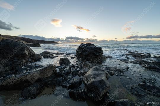 Coastal landscape at sunset with waves crashing on rocky shoreline under a cloudy sky at fuerteventura  : Stock Photo or Stock Video Download rcfotostock photos, images and assets rcfotostock | RC Photo Stock.: