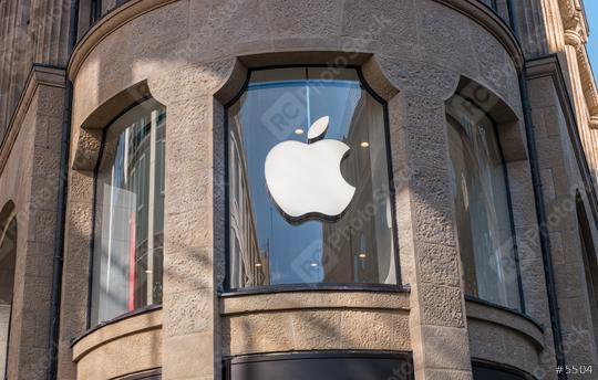 COLOGNE, GERMANY OCTOBER, 2017: Apple Logo on a Apple store. Apple is the multinational technology company headquartered in Cupertino, California and sells consumer electronics products.  : Stock Photo or Stock Video Download rcfotostock photos, images and assets rcfotostock | RC Photo Stock.: