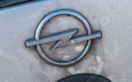 COLOGNE, GERMANY OCTOBER, 2017: Dirty Opel logo on a silver car. Opel AG is a German automobile manufacturer.  : Stock Photo or Stock Video Download rcfotostock photos, images and assets rcfotostock | RC Photo Stock.:
