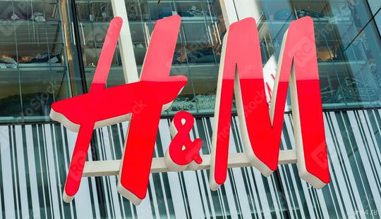 COLOGNE, GERMANY OCTOBER, 2017: H&M logo on a store. H & M Hennes & Mauritz AB is a Swedish multinational retail-clothing company, known for its fast-fashion clothing.  : Stock Photo or Stock Video Download rcfotostock photos, images and assets rcfotostock | RC Photo Stock.: