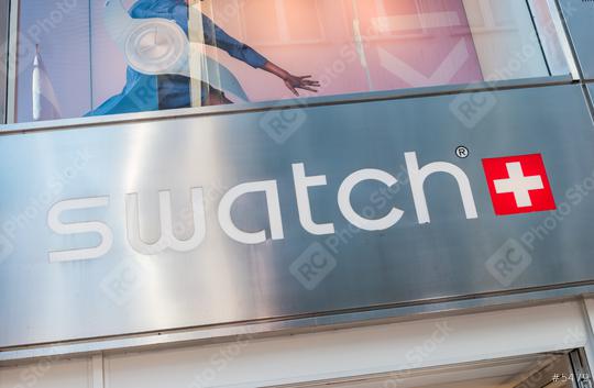 COLOGNE, GERMANY OCTOBER, 2017: Swatch watch store sign on a store. Swatch is a Swiss watchmaker founded in 1983 by Nicolas Hayek, and is subsidiary of The Swatch Group.  : Stock Photo or Stock Video Download rcfotostock photos, images and assets rcfotostock | RC Photo Stock.: