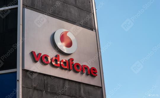 COLOGNE, GERMANY OCTOBER, 2017: Vodafone logo. Vodafone Group is a British telecommunications company headquartered in London and with its registered office in Newbury, Berkshire.  : Stock Photo or Stock Video Download rcfotostock photos, images and assets rcfotostock | RC Photo Stock.: