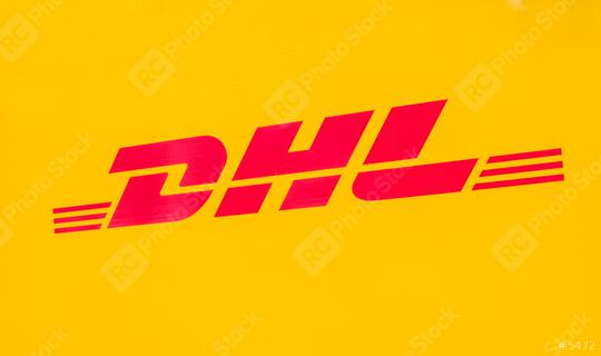 COLOGNE, GERMANY OCTOBER, 2017: Yellow DHL Logo on a truck. DHL Express is a division of the German worldwide logistics company.  : Stock Photo or Stock Video Download rcfotostock photos, images and assets rcfotostock | RC Photo Stock.: