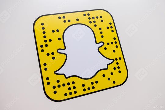 COLOGNE, GERMANY SEPTEMBER, 2017: Snapchat logo printed on a paper wall. Snapchat is a popular social media application for sharing messages, images and videos.  : Stock Photo or Stock Video Download rcfotostock photos, images and assets rcfotostock | RC Photo Stock.: