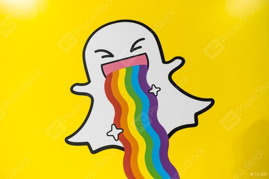 COLOGNE, GERMANY SEPTEMBER, 2017: Snapchat logo with rainbow printed on a paper wall. Snapchat is a popular social media application for sharing messages, images and videos.  : Stock Photo or Stock Video Download rcfotostock photos, images and assets rcfotostock | RC Photo Stock.: