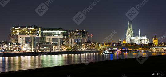 Cologne Skyline with Cathedral and crane houses at night  : Stock Photo or Stock Video Download rcfotostock photos, images and assets rcfotostock | RC Photo Stock.:
