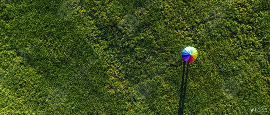 Colorful of umbrella on a green summer meadow, banner size - aerial drone shot  : Stock Photo or Stock Video Download rcfotostock photos, images and assets rcfotostock | RC Photo Stock.: