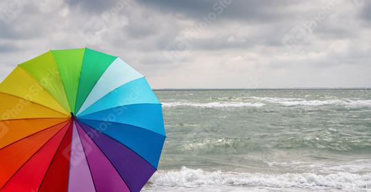 Colorful of umbrella on the beach and foam of sea waves at a thunderstorm, Weather concept image  : Stock Photo or Stock Video Download rcfotostock photos, images and assets rcfotostock | RC Photo Stock.: