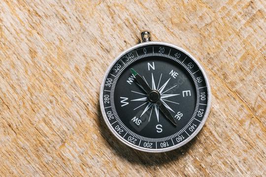 compass on a table concept for direction, travel, guidance or assistance  : Stock Photo or Stock Video Download rcfotostock photos, images and assets rcfotostock | RC Photo Stock.: