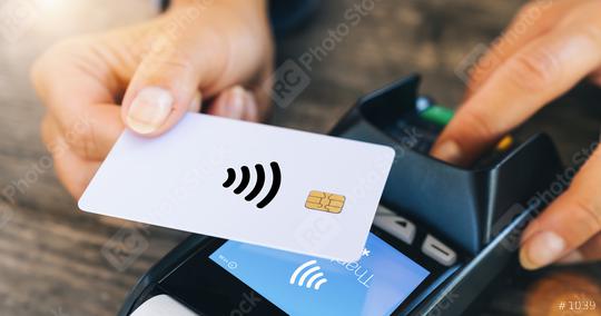 Contactless payment concept, female customer holding credit card near nfc technology on counter, client make transaction pay bill on terminal rfid cashier machine in restaurant, close up view  : Stock Photo or Stock Video Download rcfotostock photos, images and assets rcfotostock | RC Photo Stock.: