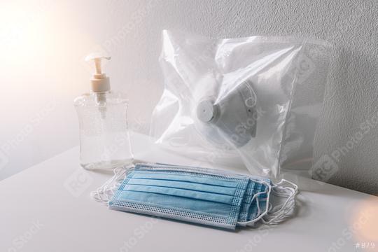 Coronavirus corona virus prevention travel surgical masks and hand sanitizer gel for hand hygiene spread protection.  : Stock Photo or Stock Video Download rcfotostock photos, images and assets rcfotostock | RC Photo Stock.: