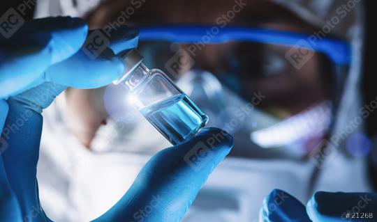coronavirus COVID-19 vaccine injection syringe in hands of pharmacuetical and vaccine research scientist in laboratory, corona virus covid 19 vaccine development concept image  : Stock Photo or Stock Video Download rcfotostock photos, images and assets rcfotostock | RC Photo Stock.: