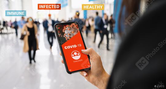 coronavirus tracking app on a mobile smartphone. Close up of woman tracking crowd of people in a smartphone screen application. Hand holding smart device. Mockup website. covid-19 corona virus tracker  : Stock Photo or Stock Video Download rcfotostock photos, images and assets rcfotostock | RC Photo Stock.: