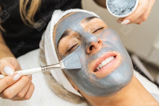 cosmetologist making dead sea mud mask on face for rejuvenation   : Stock Photo or Stock Video Download rcfotostock photos, images and assets rcfotostock | RC Photo Stock.: