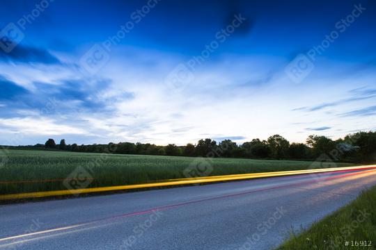 Country road with car light strips at dusk  : Stock Photo or Stock Video Download rcfotostock photos, images and assets rcfotostock | RC Photo Stock.:
