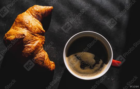 Croissants with coffee. french croissants on plate and red cup of coffee on a dark table background, top view  : Stock Photo or Stock Video Download rcfotostock photos, images and assets rcfotostock | RC Photo Stock.: