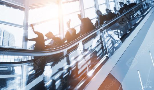 crowd of anonymous blurred business people rushing on a escalator in a business center  : Stock Photo or Stock Video Download rcfotostock photos, images and assets rcfotostock | RC Photo Stock.: