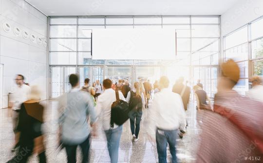 Crowd of anonymous people walking at a trade show, with copy space banner  : Stock Photo or Stock Video Download rcfotostock photos, images and assets rcfotostock | RC Photo Stock.: