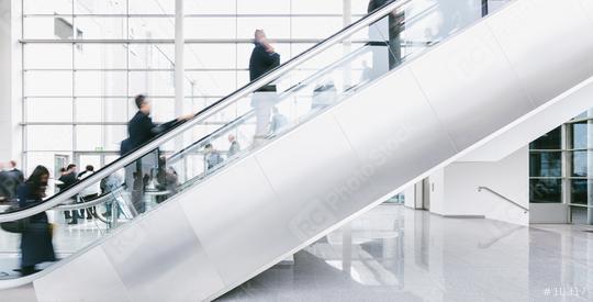 crowd of blurred business people rushing on escalators  : Stock Photo or Stock Video Download rcfotostock photos, images and assets rcfotostock | RC Photo Stock.: