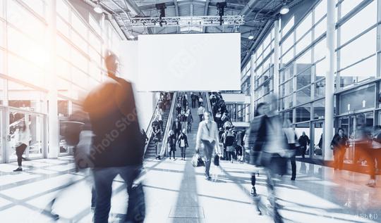 crowd of blurred people at a trade show, including copy space banner   : Stock Photo or Stock Video Download rcfotostock photos, images and assets rcfotostock | RC Photo Stock.:
